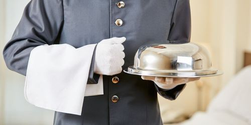 From Manhattan to the Maldives: The Storied Origins of Butler Service at St. Regis Vommuli